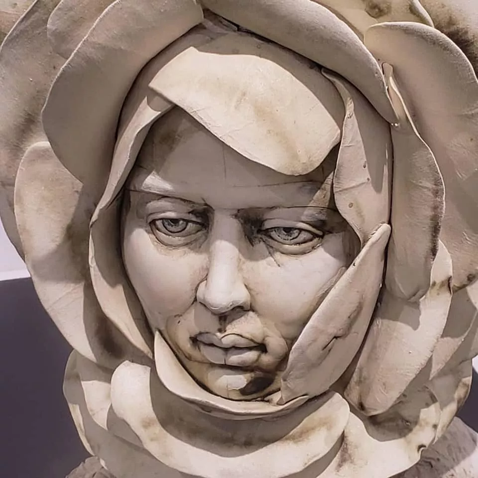 Yukhno's sculpture of a face in a flower